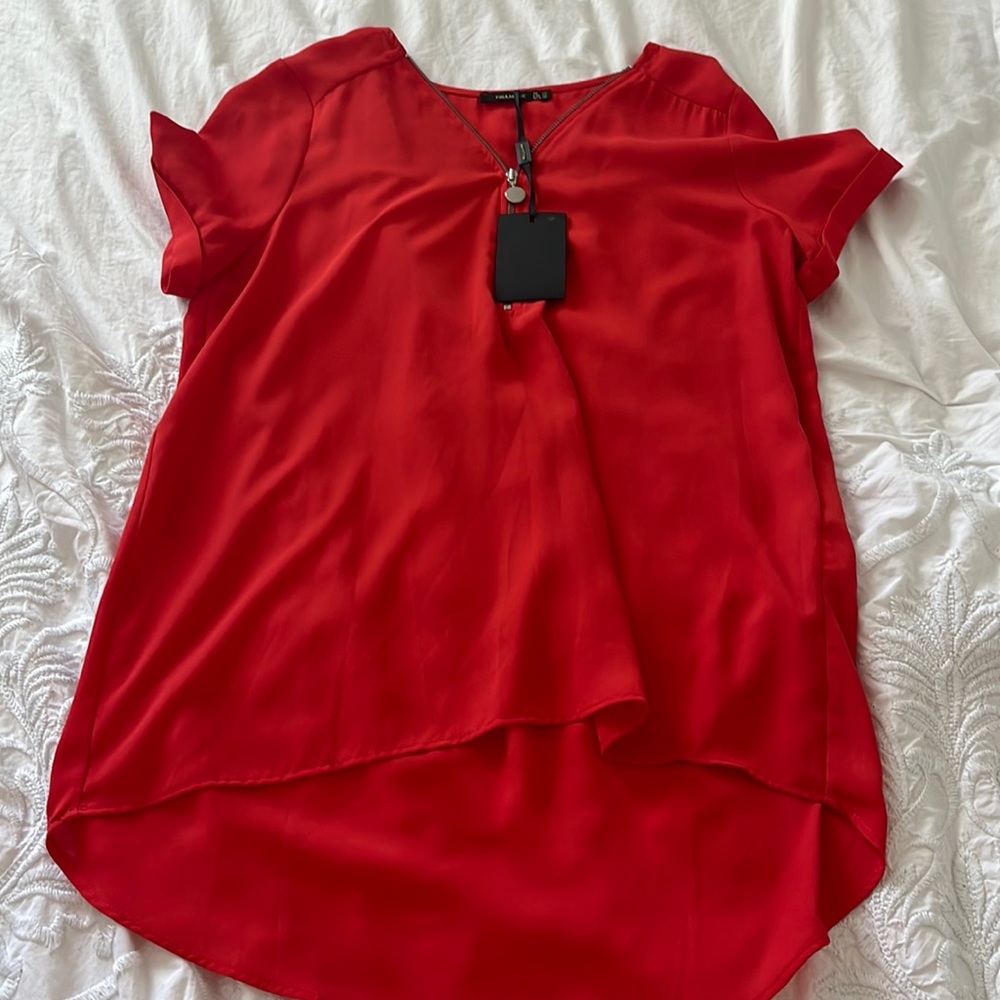 red blouse with zipper